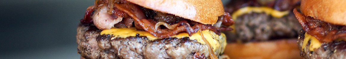 Eating Burger Hot Dog at Spike's Junk Yard Dogs - Warwick restaurant in Warwick, RI.